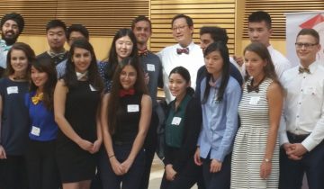 UBC President Santa Ono surrounded by summer students at the Centre for Blood Research. Photo credit: Brian Kladko
