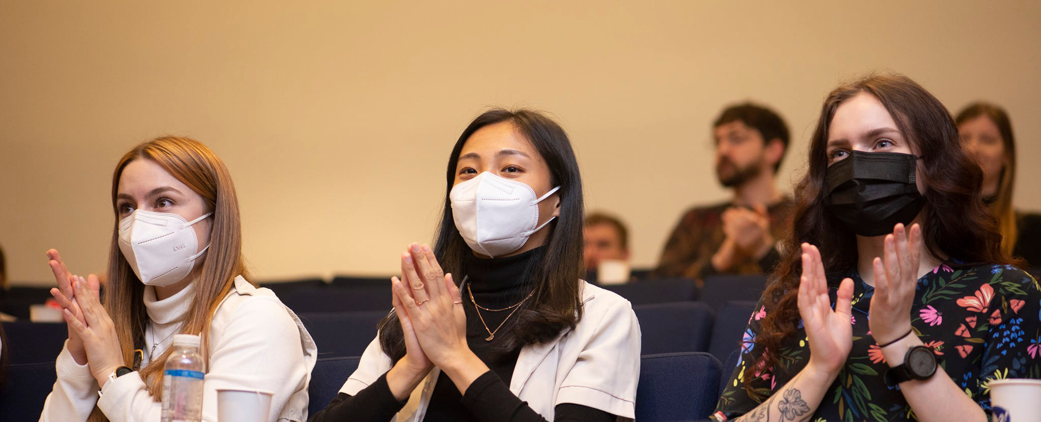 Writers Marie-Soleil (left) and Nancy Yang (middle) attend the symposium along with their lab mate Tetiana Povshedna (right)