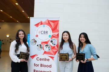 Summer students who won awards holding their award plaques. L – R: Sofia Levy, Côté Lab (People’s Choice Award); Melody Weng, supervised by Dr. Andrew Shih (Best Oral Presentation); Tien Do, Hancock Lab (Best Poster Presentation).