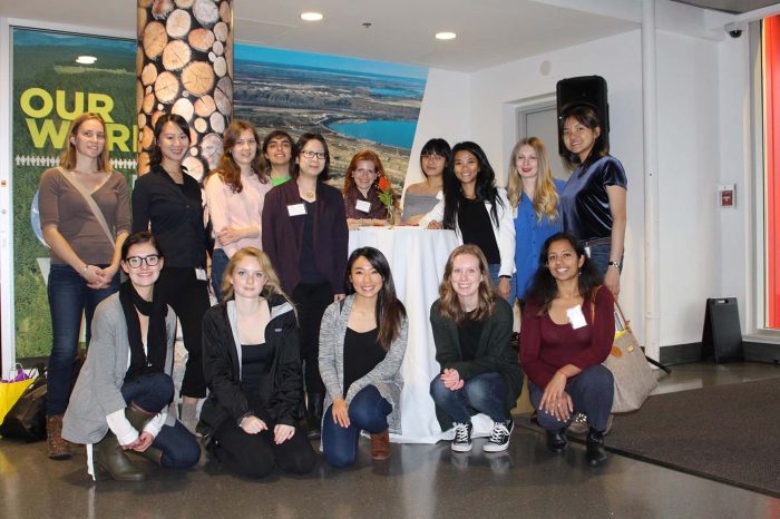 CBR alum Eva Yap (top row, third from right) at a Science World Girls and STEAM event with the CBR Outreach Committee